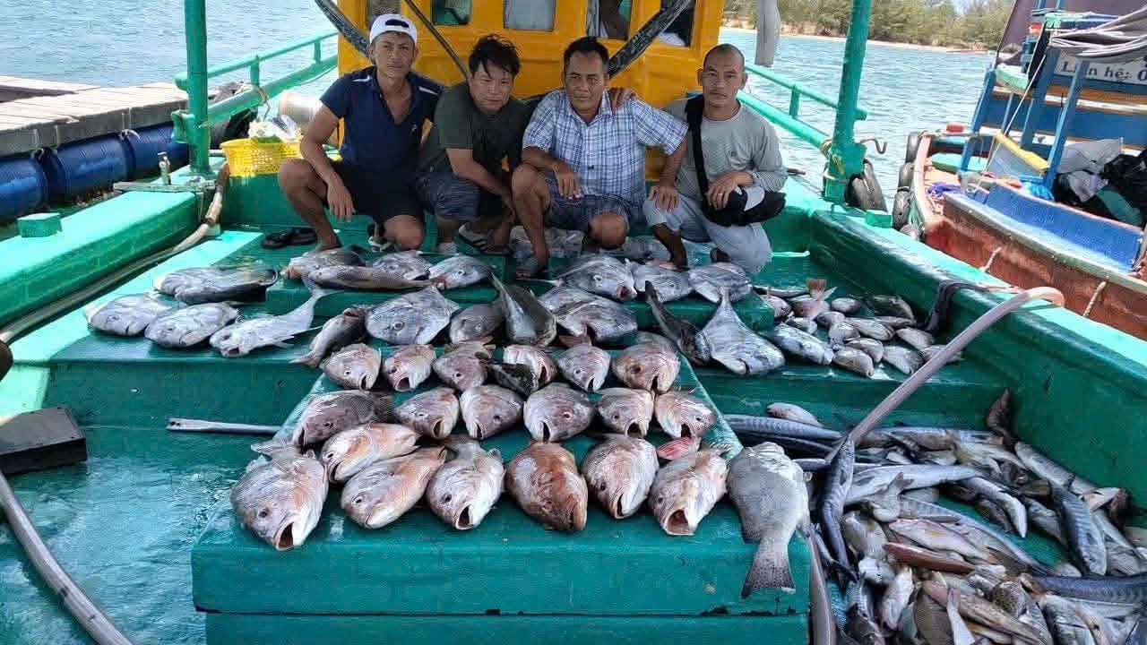 Guest on deck during a first offshore fishing trip from Da Nang
